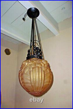 Ancienne suspension fer forgé et globe verre ambre Art déco