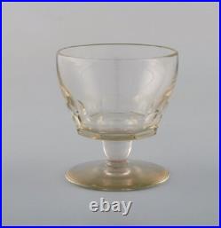 Baccarat, France. Huit verres Art déco coupés à facettes. Art glass, 1930 / 4