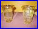 Paire de vases art déco en verre moulé pressé à bords renversés de couleur jaune