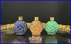 Trois flacons à parfum Art Déco en verre satiné