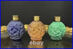 Trois flacons à parfum Art Déco en verre satiné